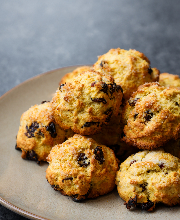 Piles of cherry scones on a plate