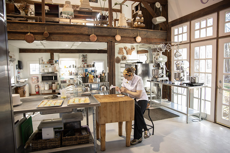 Chef Rebecca Shuster working in Farmhouse Sweets bakery.