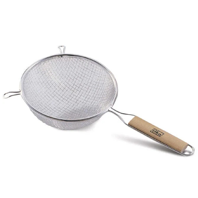 A metal strainer with a light wooden handle