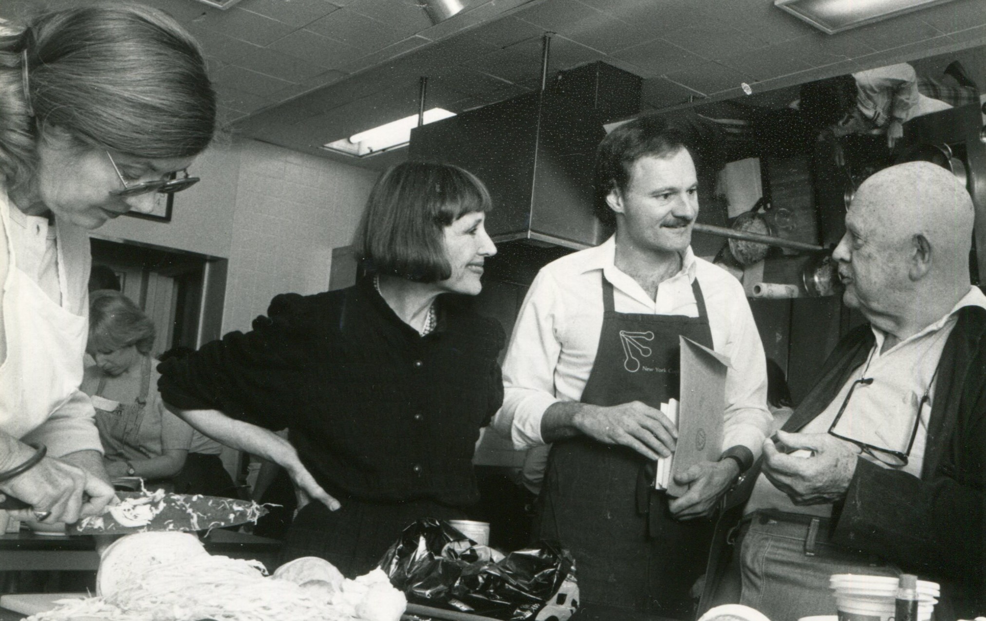 Peter Kump, James Beard and two women in a black and white photo