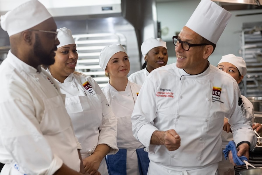ICE Chef-Instructor Roger and students in the kitchen at the NYC campus.
