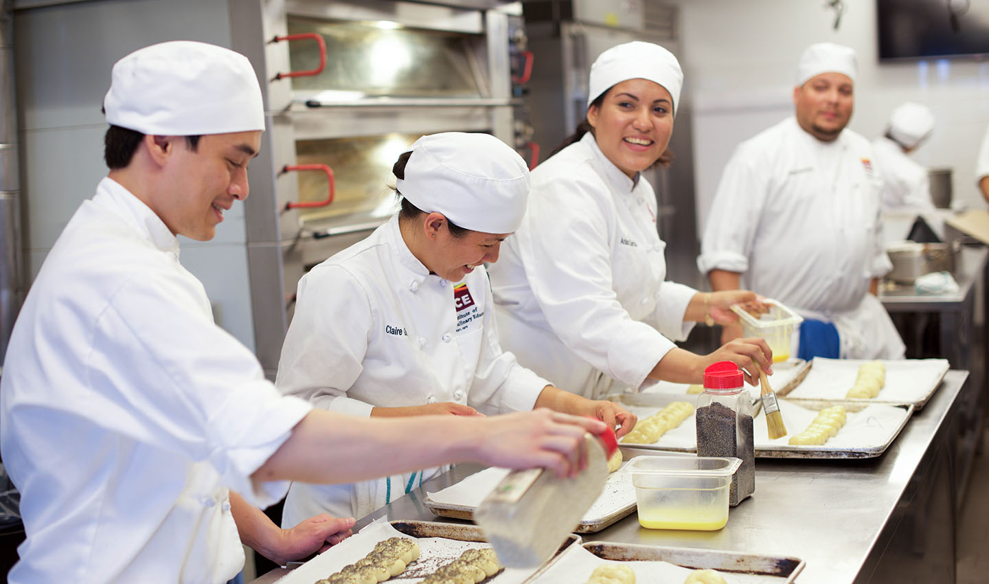 Students work in a pastry and baking class