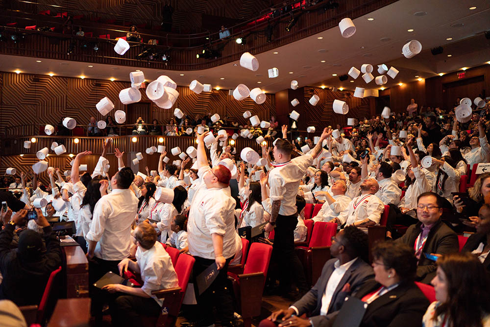 2019 ICE graduates toss their toques