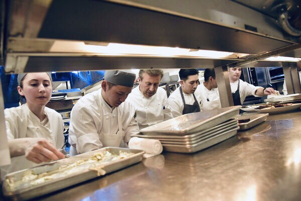 Chef Richard works the line with visiting Chef Daniel Boulud at CUT during at New York City Wine & Food Festival event.