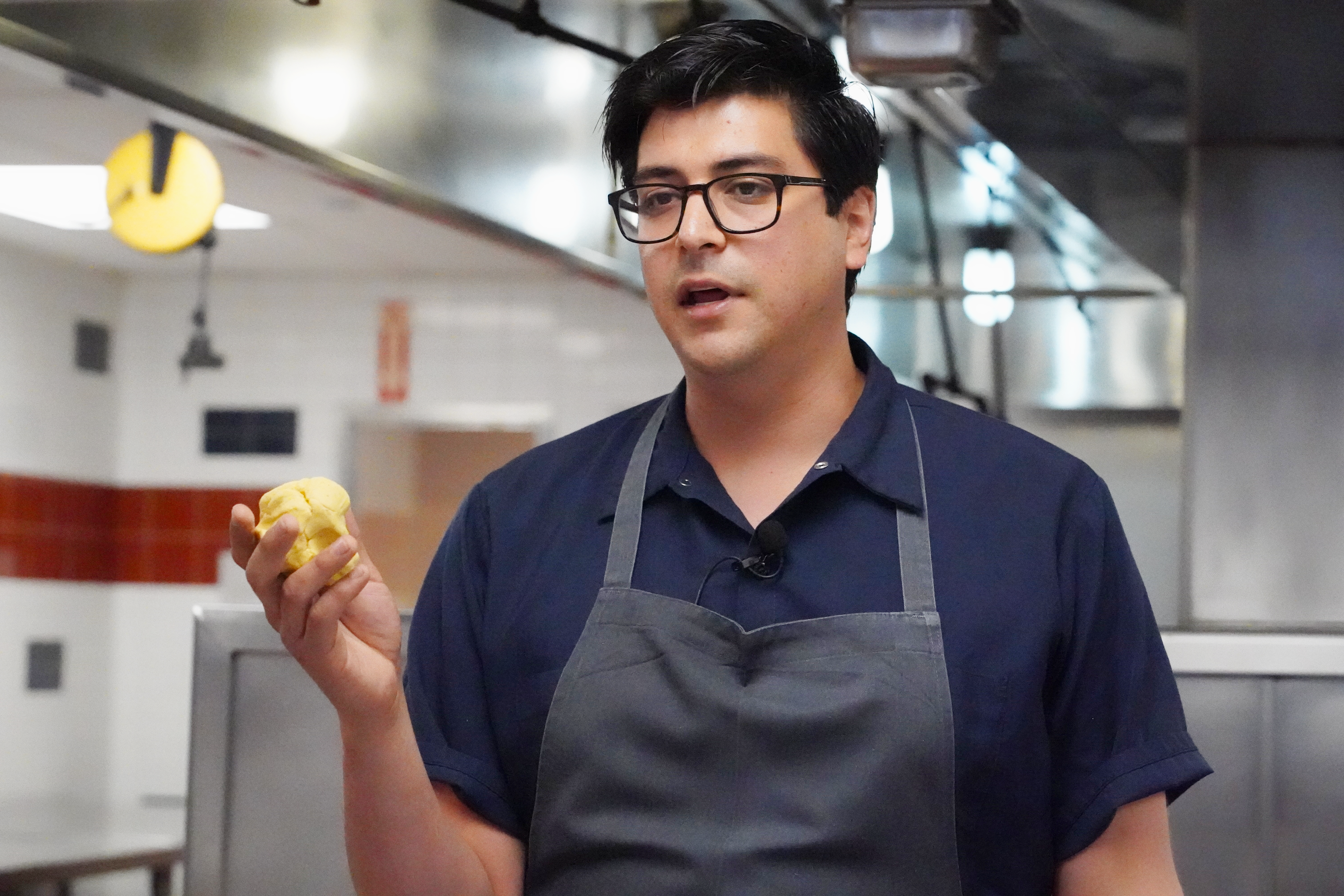 Chef Cervantes holds corn masa