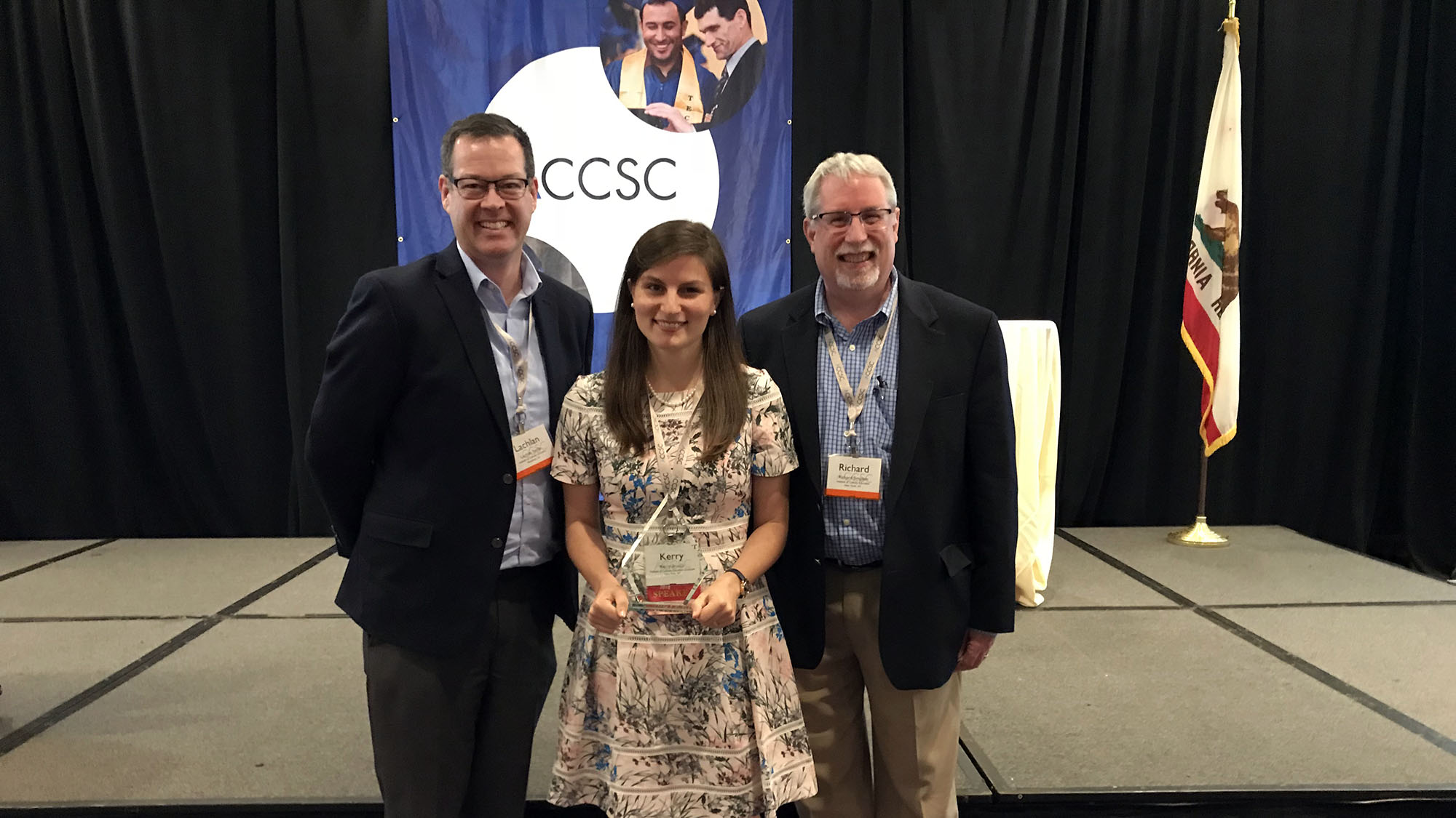 ICE Los Angeles Campus President Lachlan Sands and VP of Education Richard Simpson congratulate Kerry Brodie on her ACCSC Outstanding Graduate Award.
