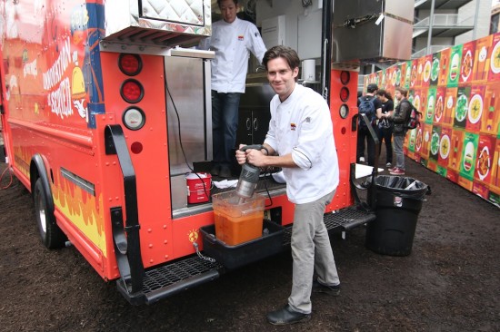 Chef James whips up tomato gravy for 600 hungry visitors to the food truck.