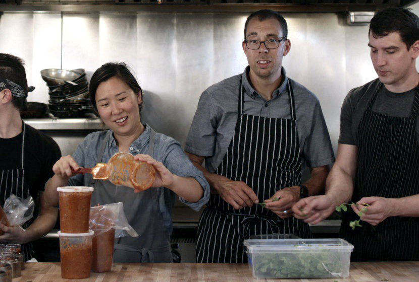 Rachel Yang Chef of Relay Restaurant Group in the kitchen with her staff