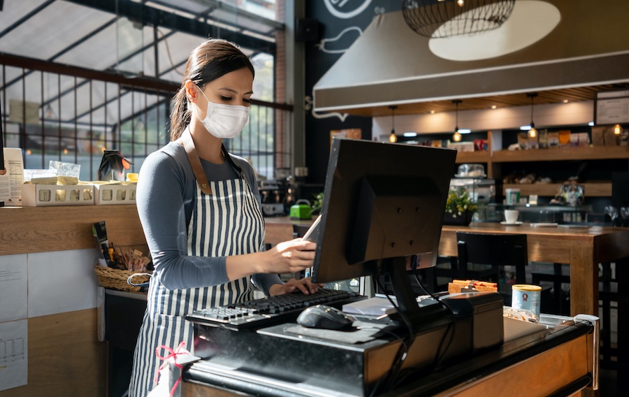 a restaurant worker on a POS system