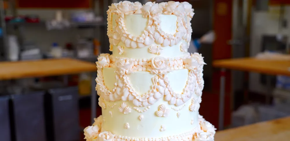 A white cake frosted with Chef Carrie Smith's Swiss meringue buttercream recipe