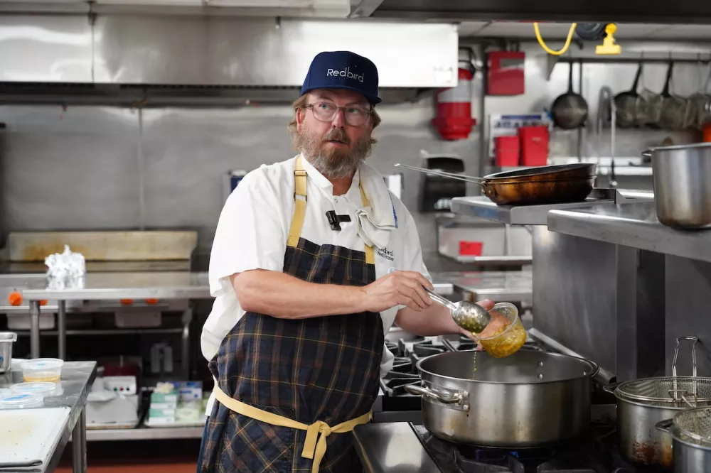 Chef Neal Fraser cooking at ICE