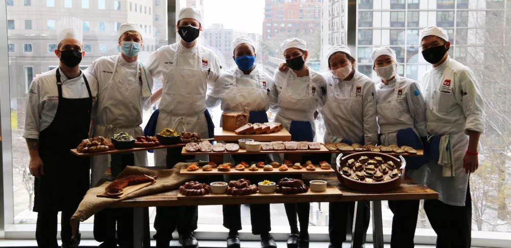 Chef-Instructor Chris Arturo with Culinary Arts students on charcuterie day.