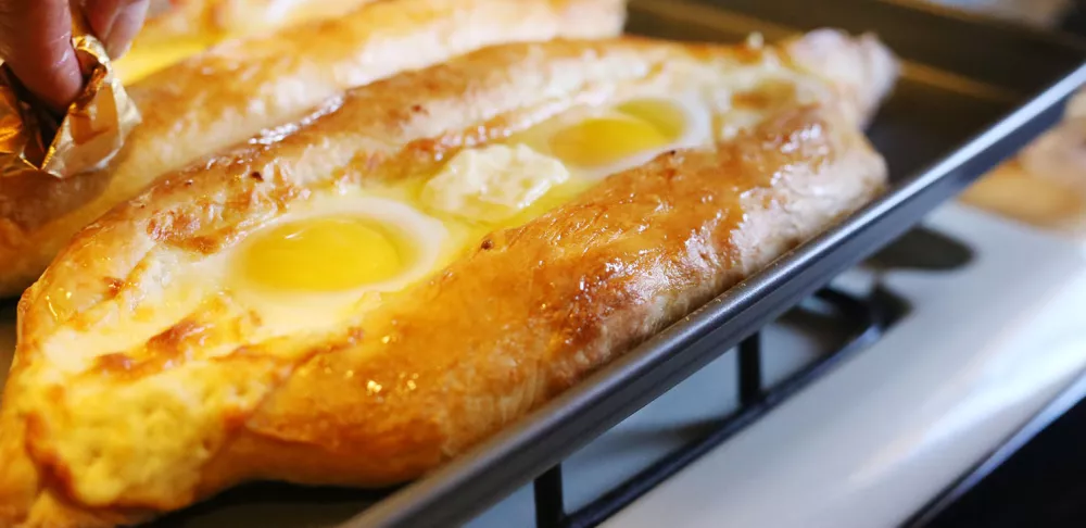 Adjaruli Khachapuri (Boat-Shaped Georgian Cheese Bread)