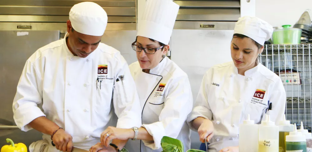 culinary students learning from their instructor