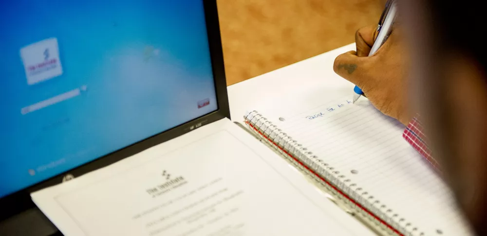 culinary management student's laptop and notebook