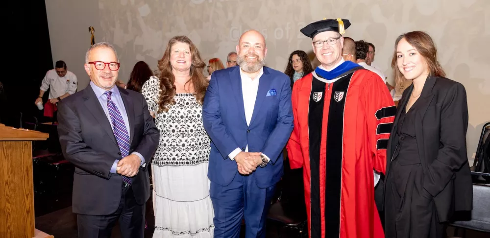 ICE graduate Megan Fogarty smiles with ICE LA president Lachlan Sands, Chef Evan Funke, ICE LA Director of Restaurant and Culinary Management Mishel LeDoux and ICE President and Chairman Rick Smilow.