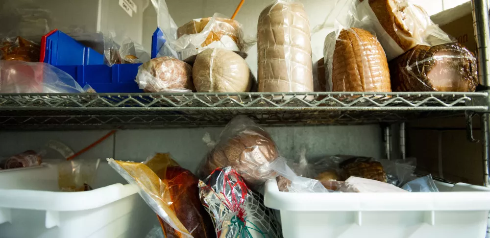 shelves in walk in refrigerator in restaurant