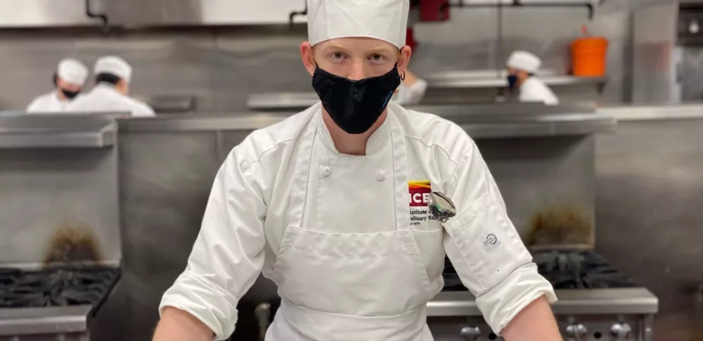 Former taekwondo and figure skating competitor Robert Hennings studies Culinary Arts