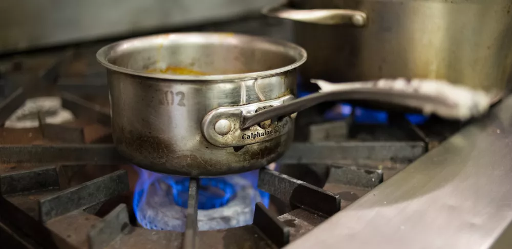 all clad pan on range making sauce