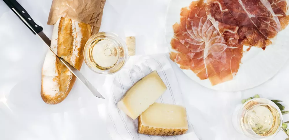 cheese Meat and Wine on a table