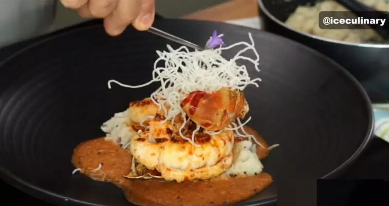 grilled lobster, tomato coconut sauce upma