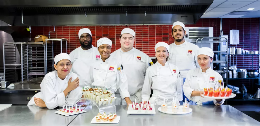 A group of ICE students in classroom kitchen