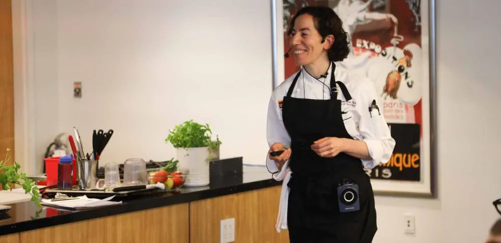 Chef Celine leads a cooking demonstration on health-supportive foods.