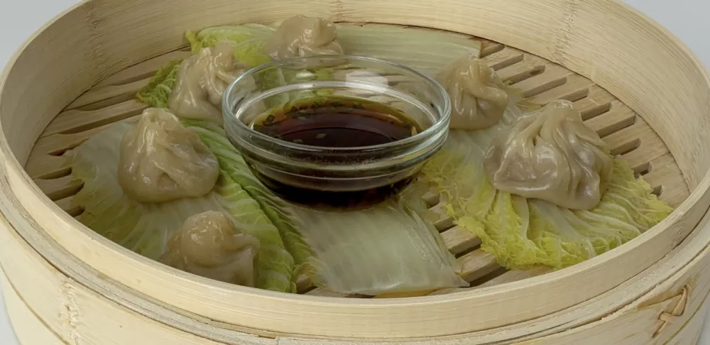 Soupy Pork Dumplings with Soy Vinegar Ginger Sauce