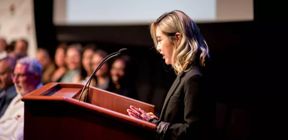 Esther Choi speaking at ICE Commencement.