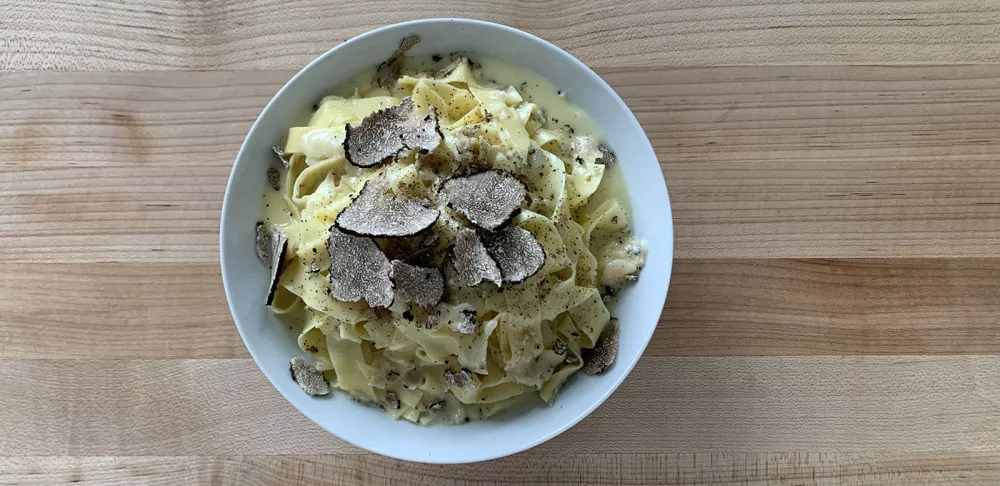 A bowl of fettucine alfredo