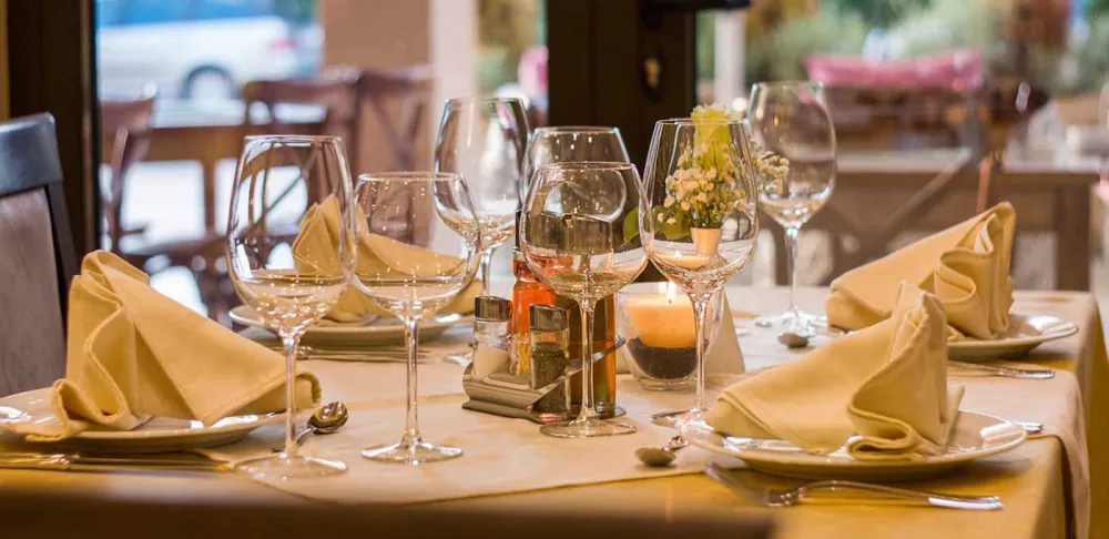 Wine glasses on a restaurant table.