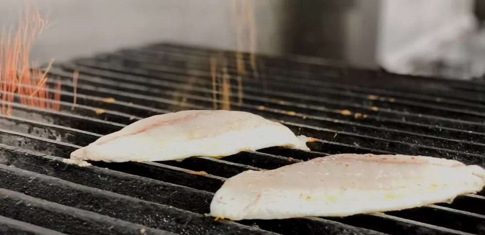 fish on the grill in culinary arts class