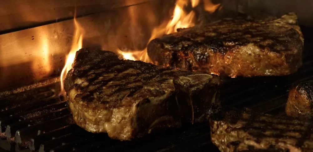 steaks on a grill at ICE