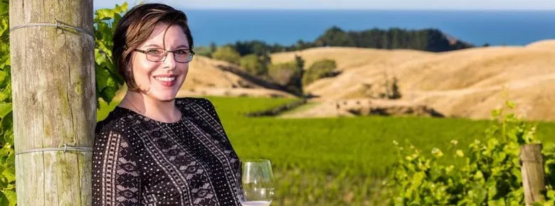 Woman holding wine glass