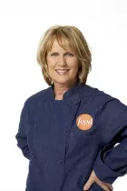 ICE grad Susan Stockton wearing denim Food Network chef coat.