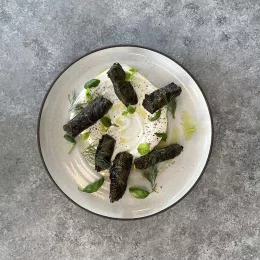 Fermented Grape Leaves on a plate.