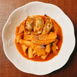 rice cakes in a Korean dish photo by Grace Lee