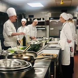 Lead Chef Elliott Prag instructs a Plant-Based Culinary Arts class.