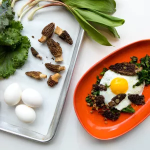foraged ingredients for sunnyside eggs over sauteed wild greens with morels and ramps