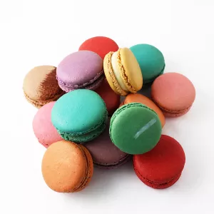 A pile of multi-colored macarons