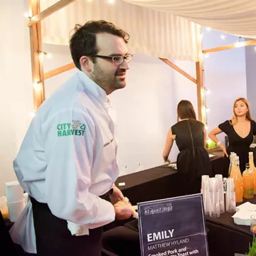 matt hyland of emily restaurant at a city harvest charity event