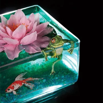 an airbrushed cake to look like a goldfish lily pond by Lisa Berczel