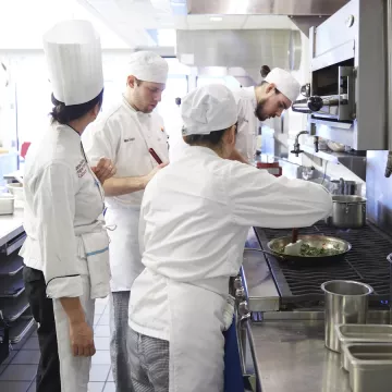 chefs working in the new kitchens at the institute of culinary education