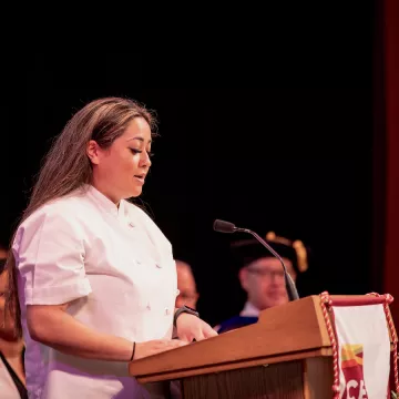 ICE LA's 2023 alumni speaker Jessica Alferos speaks at commencement