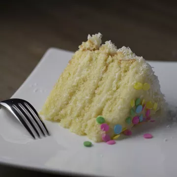 A slice of cake on a plate.