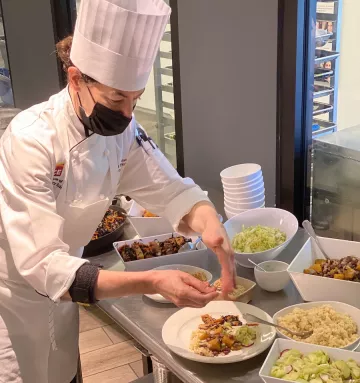 Chef Celine Beitchman making a plant-based meal 