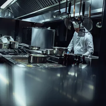 A chef in a restaurant kitchen