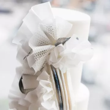 Penny Stankiewicz creates a cake design with ruffles.