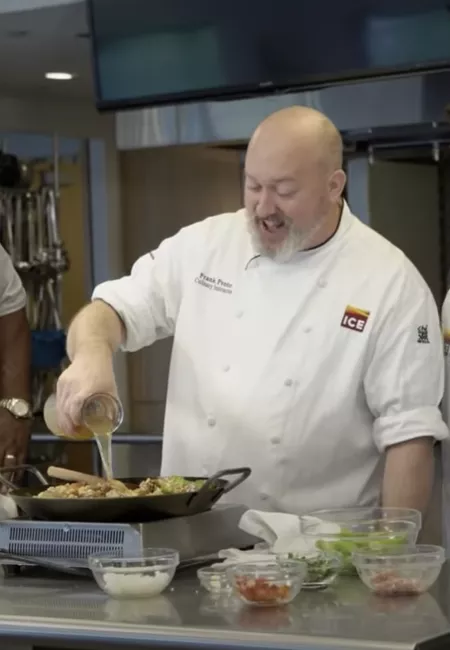 Chef Frank Proto making paella