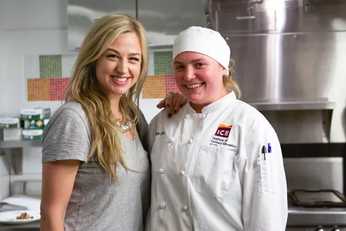 DJ Bethany Watson of Z100 with a culinary student at the Institute of Culinary Education